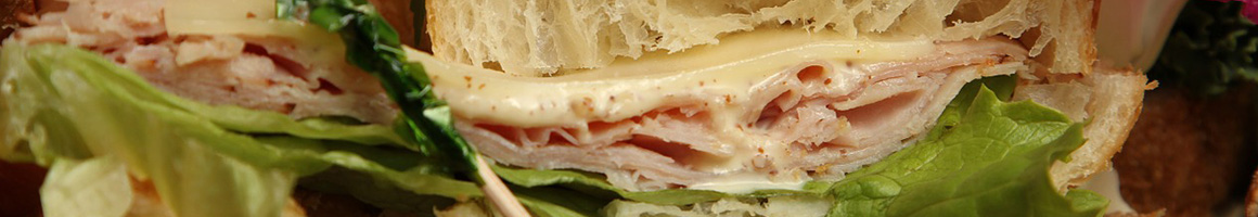 Eating American (Traditional) Mediterranean Sandwich Salad at Olga's Kitchen restaurant in Lathrup Village, MI.